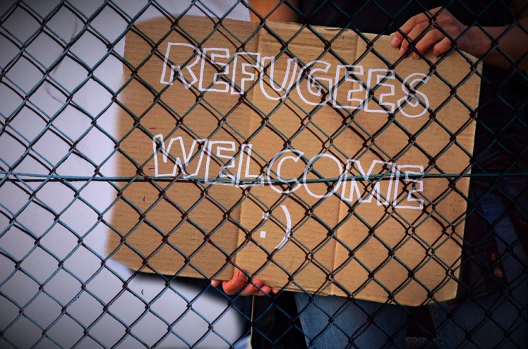 Refugees Fence Shield Welcome Note Announcement